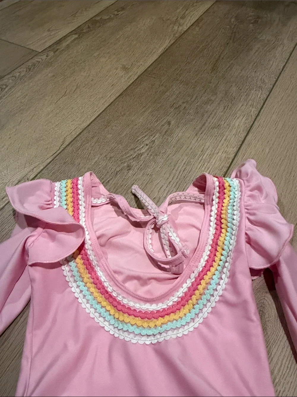 Kids Pink Ruffle One-Piece Swimsuit with Rainbow Trim. No flaws.